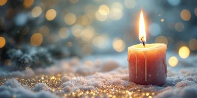 The primary subject of the image is a lit candle in a snowy environment. The candle is placed on a snow-covered surface, and the setting includes a background of snowflakes. The visual style of the image is a combination of a photo and digital art, creating a unique and captivating scene. The dominant colors in the image are white and orange, with the white snow and orange candle light creating a serene and warm atmosphere.